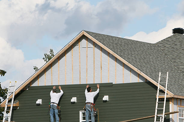 Professional Siding Replacement technician working in Greens Fork, IN